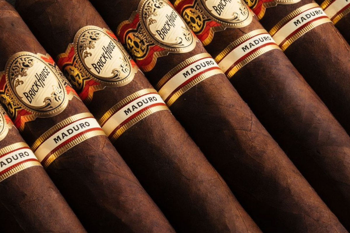 Premium handmade cigars with cutter and cedar
